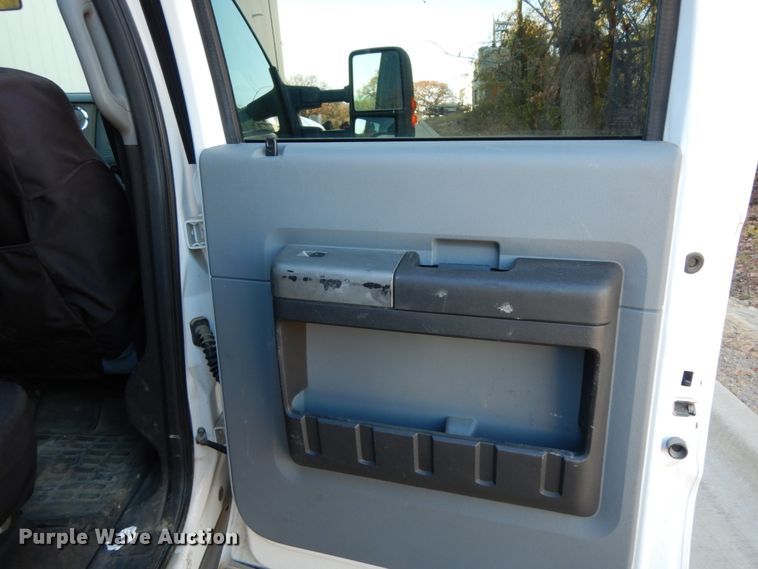 image for item DJ8131 2012 Ford F550 Super Duty  Crew Cab flatbed truck