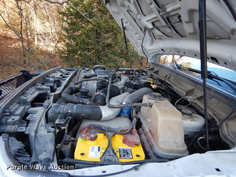 image for item DJ8131 2012 Ford F550 Super Duty  Crew Cab flatbed truck