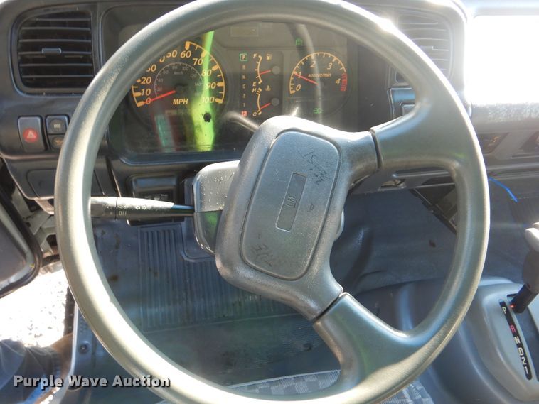 image for item HX9053 2006 GMC W4500  flatbed truck with crane