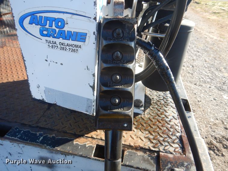 image for item HX9053 2006 GMC W4500  flatbed truck with crane