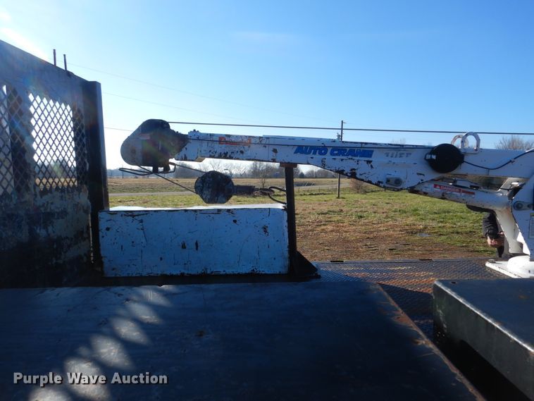 image for item HX9053 2006 GMC W4500  flatbed truck with crane