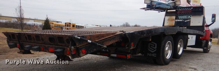 image for item HX9066 2006 GMC C8500  rollback truck