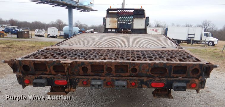 image for item HX9066 2006 GMC C8500  rollback truck