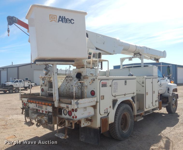 image for item DJ4905 1999 GMC C7500  bucket truck