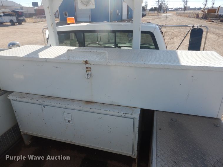 image for item DJ4905 1999 GMC C7500  bucket truck