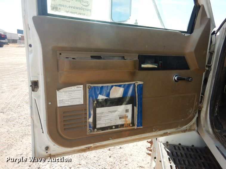 image for item DJ4905 1999 GMC C7500  bucket truck