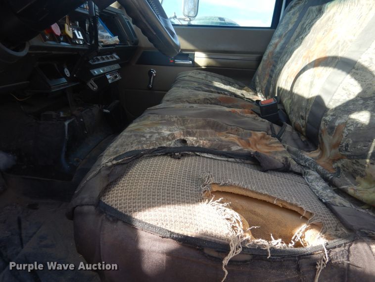 image for item DJ4905 1999 GMC C7500  bucket truck