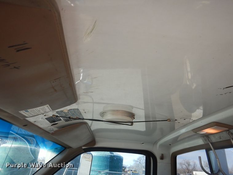 image for item DJ4905 1999 GMC C7500  bucket truck