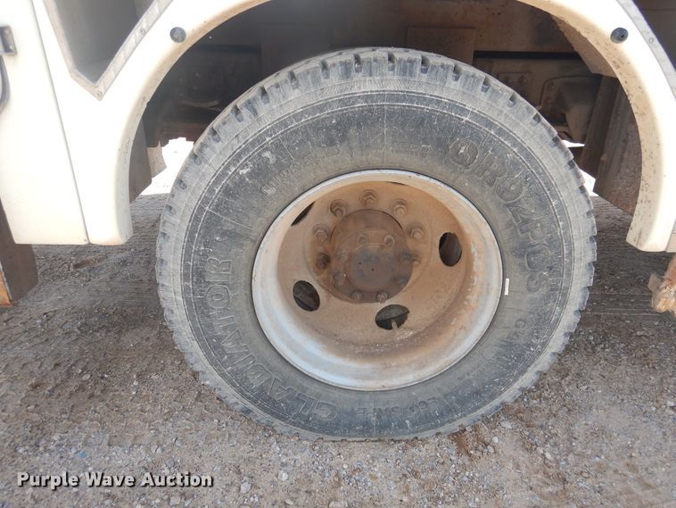 image for item DJ4905 1999 GMC C7500  bucket truck