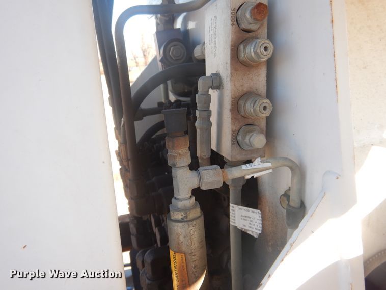 image for item DJ4909 2002 Ford F750 Super Duty  Pressure digger derrick truck