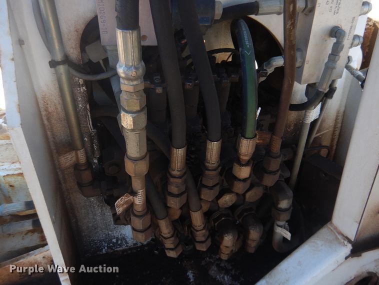 image for item DJ4909 2002 Ford F750 Super Duty  Pressure digger derrick truck