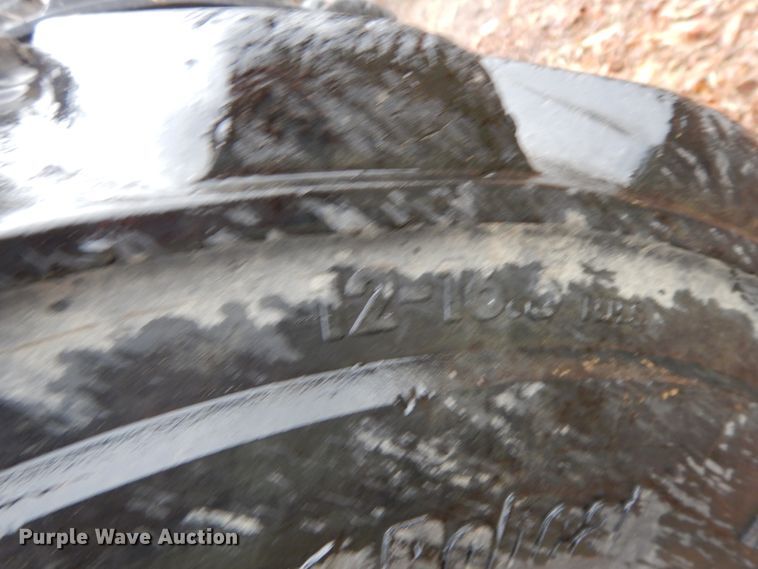 image for item GK9643 (4) 12-16.5 tires and wheels