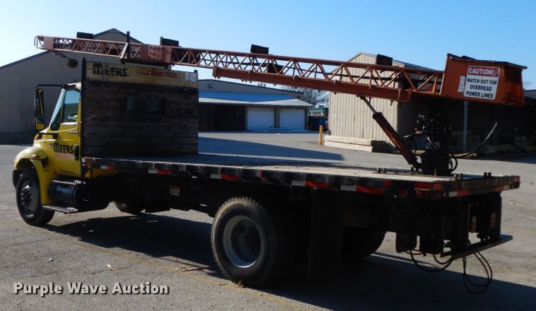 image for item HP9105 2004 International 4300  flatbed truck with conveyor