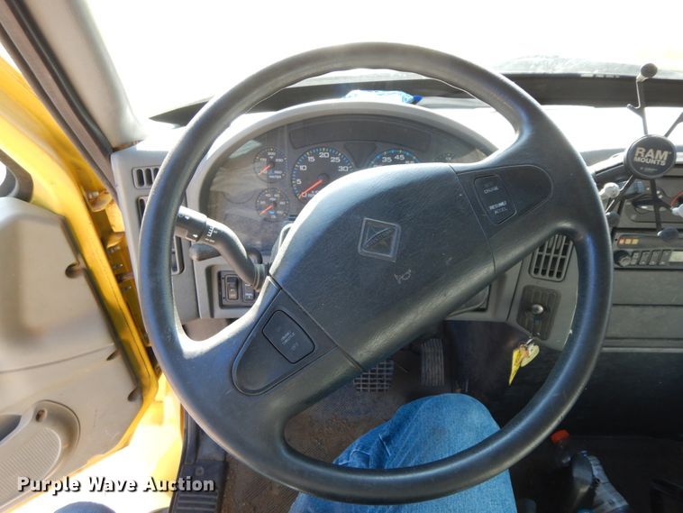 image for item HP9105 2004 International 4300  flatbed truck with conveyor