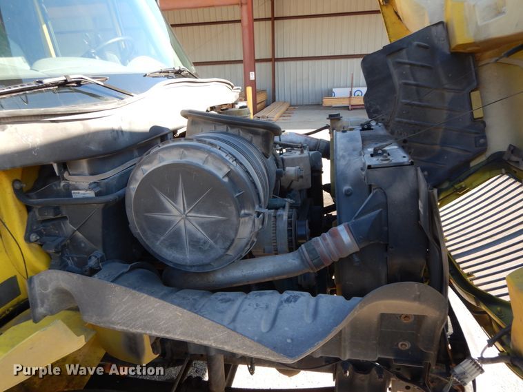 image for item HP9105 2004 International 4300  flatbed truck with conveyor