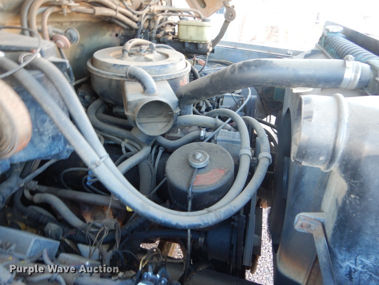 image for item HU9968 1988 Ford F700  chipper truck