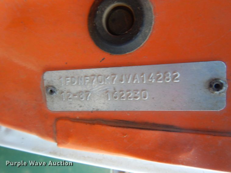 image for item HU9968 1988 Ford F700  chipper truck