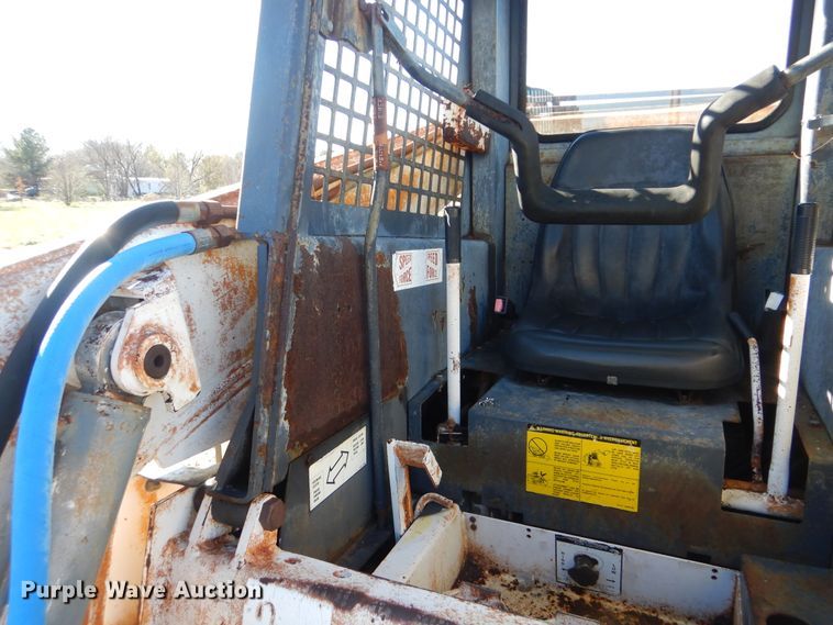 image for item HX9059 Bobcat 975  skid steer loader