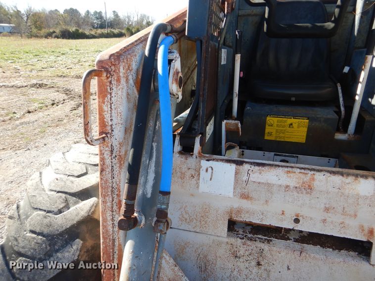 image for item HX9059 Bobcat 975  skid steer loader