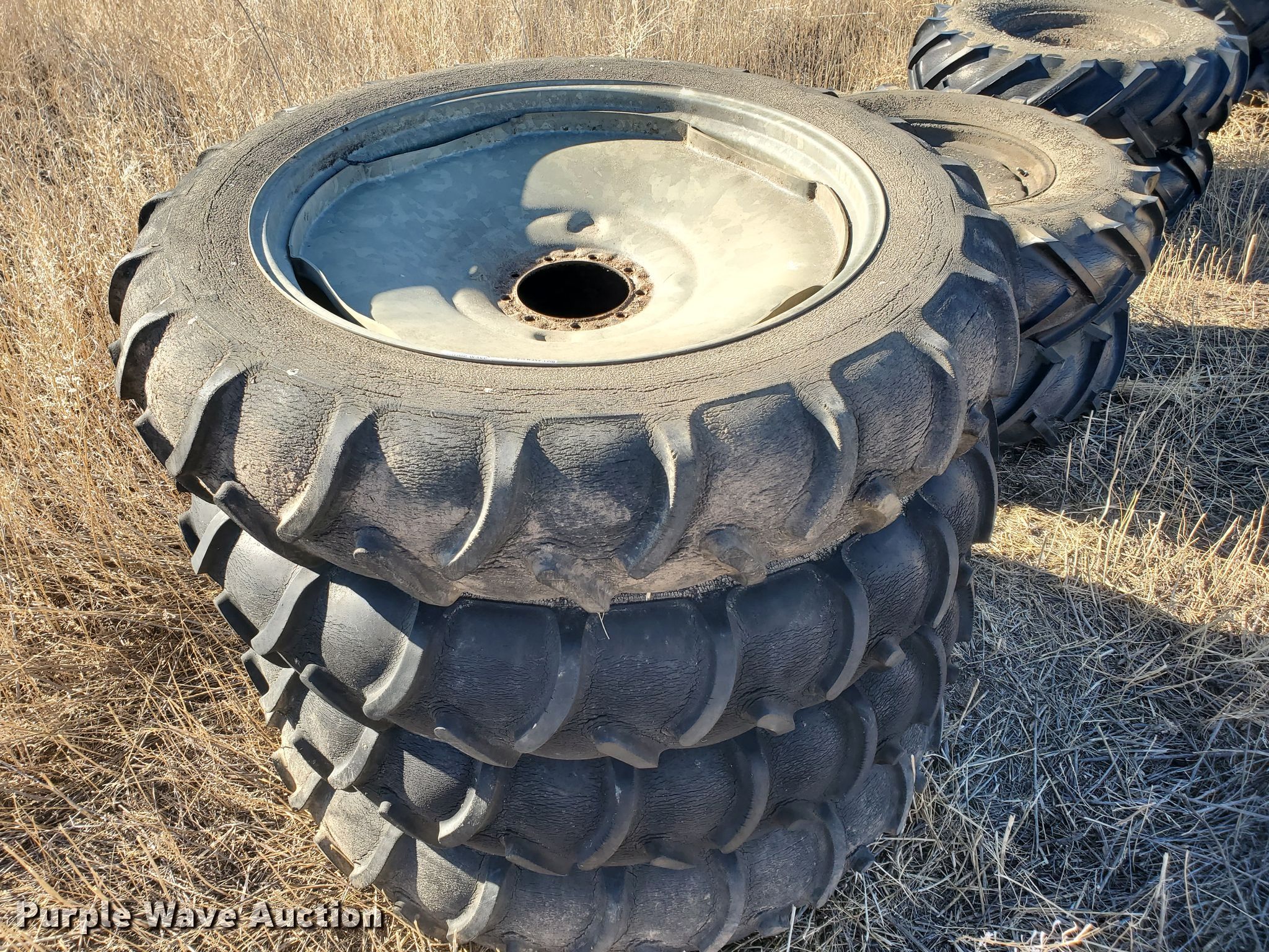 (12) irrigation tires and wheels in KS Item HW9577 sold Purple Wave