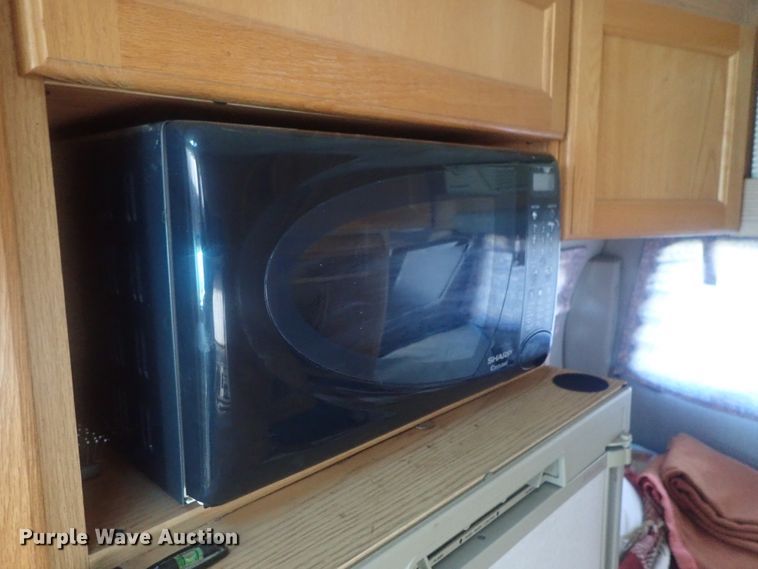 image for item DI7485 2002 Chevrolet Express 3500  Roadtrek 200 Versatile RV