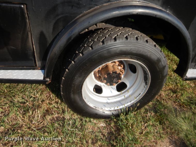 image for item DJ2046 2013 Dodge Ram 5500  Crew Cab flatbed truck