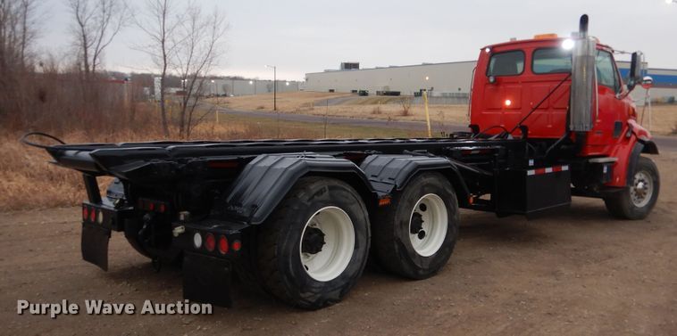 image for item AF9902 2002 Sterling L-Line  roll-off container truck
