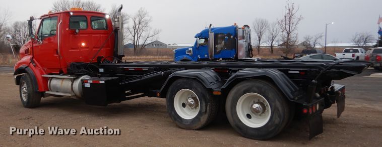 image for item AF9902 2002 Sterling L-Line  roll-off container truck