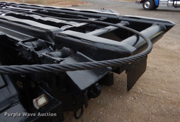 image for item AF9902 2002 Sterling L-Line  roll-off container truck