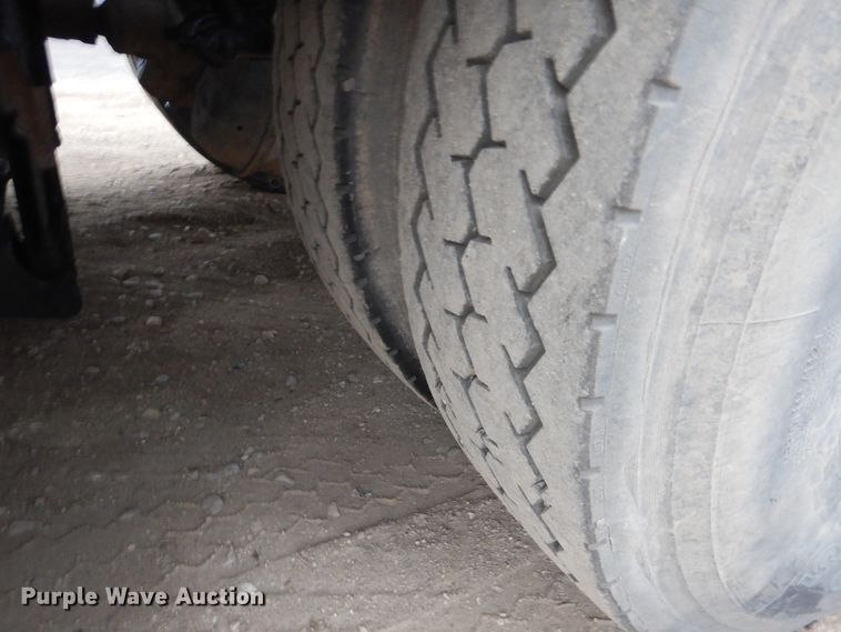 image for item AF9902 2002 Sterling L-Line  roll-off container truck