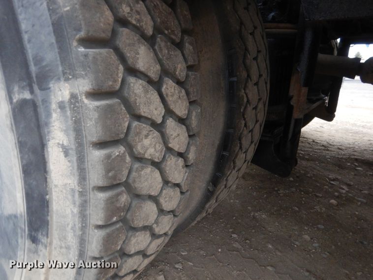 image for item AF9902 2002 Sterling L-Line  roll-off container truck