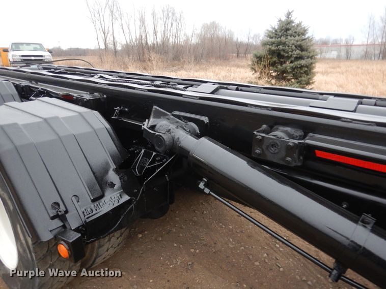 image for item AF9902 2002 Sterling L-Line  roll-off container truck