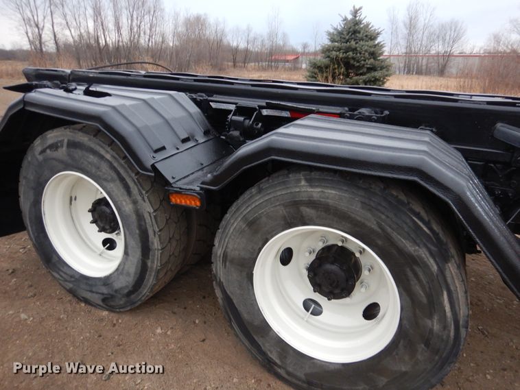 image for item AF9902 2002 Sterling L-Line  roll-off container truck