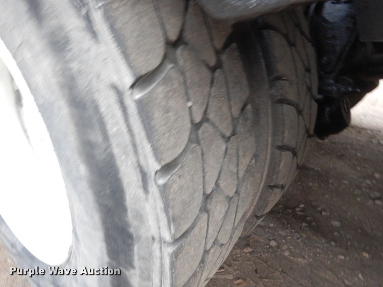 image for item AF9902 2002 Sterling L-Line  roll-off container truck