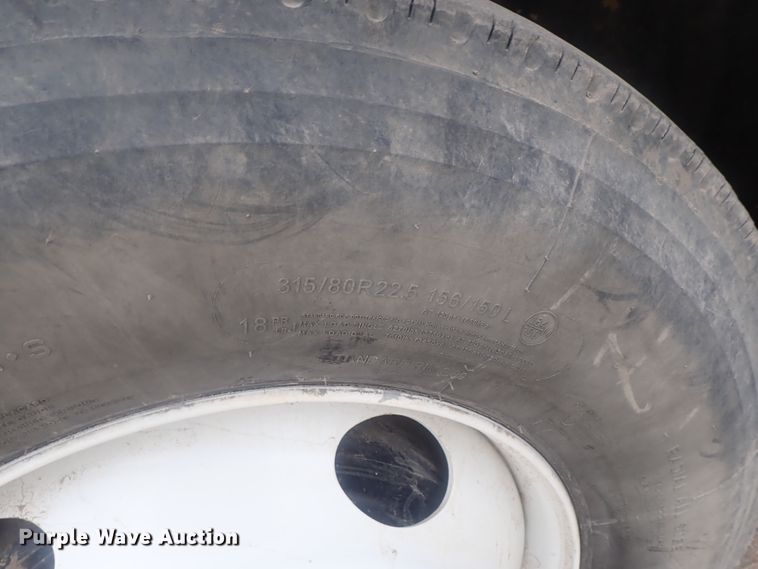 image for item DI7490 2007 Freightliner Business Class M112 roll-off container truck