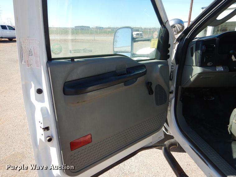 image for item HC9144 2007 Ford F550  flatbed truck with crane