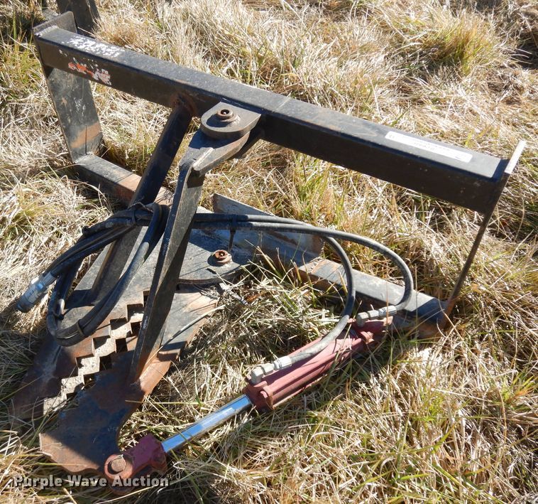 Skid steer tree puller in Osawatomie, KS Item IG9060 sold Purple Wave