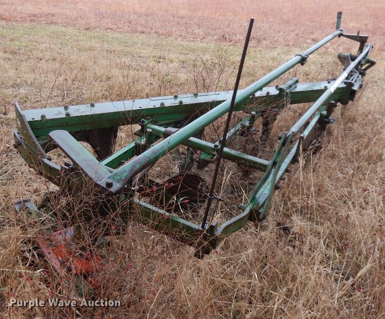 image for item IG9140 Oliver 565 one-way four bottom plow