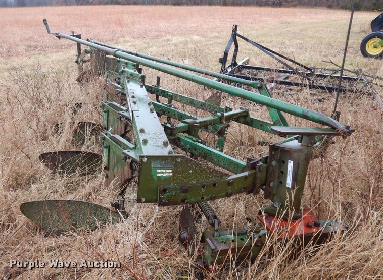 image for item IG9140 Oliver 565 one-way four bottom plow