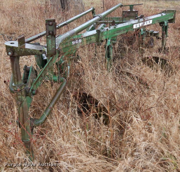 image for item IG9140 Oliver 565 one-way four bottom plow
