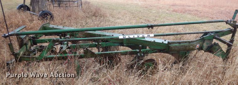image for item IG9140 Oliver 565 one-way four bottom plow