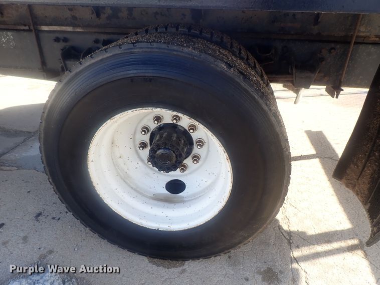 image for item DG2936 2002 Freightliner FL60  flatbed truck