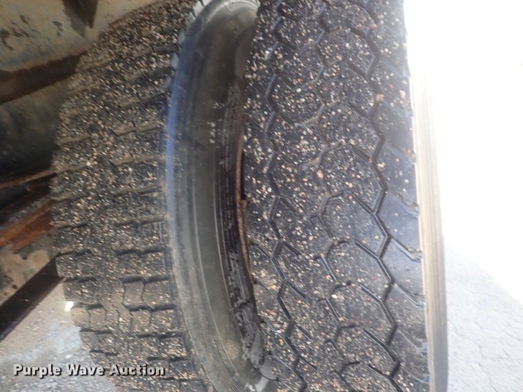 image for item DG2936 2002 Freightliner FL60  flatbed truck