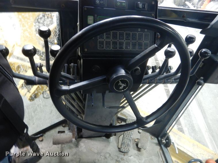 image for item IG9099 2004 John Deere 770CH Series II  motor grader