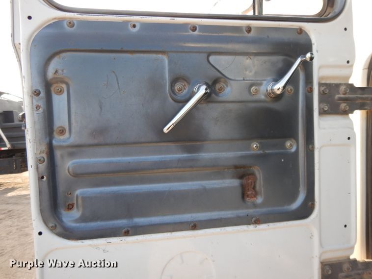 image for item DL2637 1995 Mack DM600  roll-off container truck