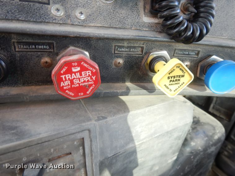 image for item DL2637 1995 Mack DM600  roll-off container truck