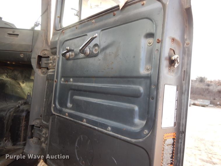 image for item DL2637 1995 Mack DM600  roll-off container truck