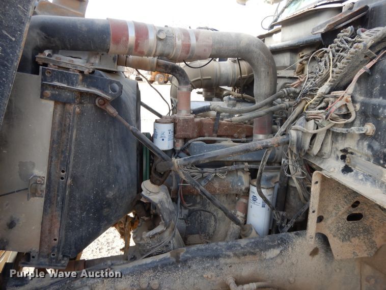 image for item DL2637 1995 Mack DM600  roll-off container truck