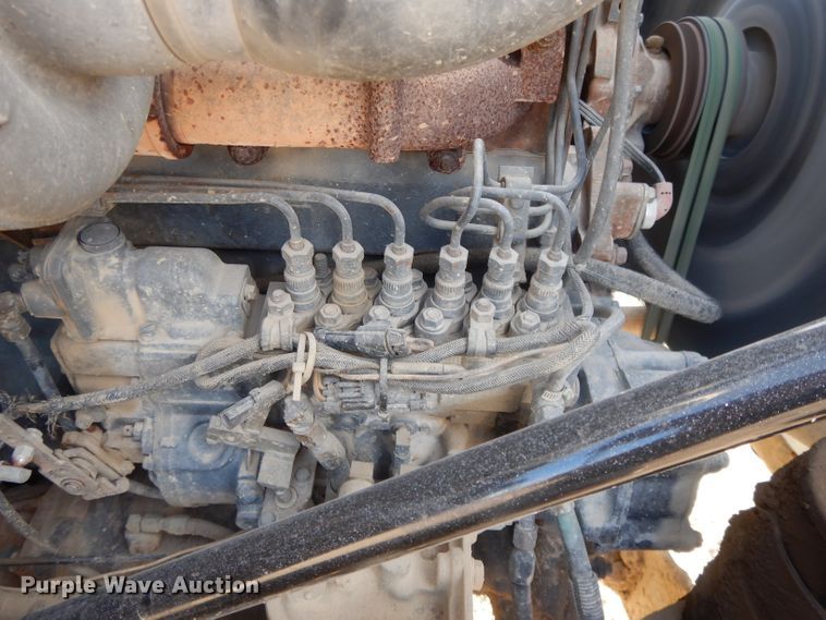 image for item DL2637 1995 Mack DM600  roll-off container truck