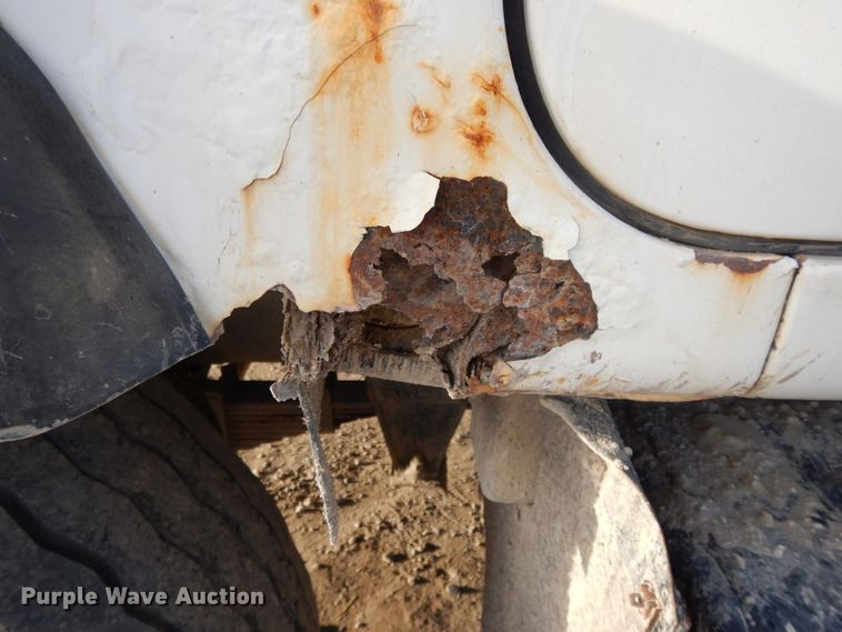 image for item DL2637 1995 Mack DM600  roll-off container truck